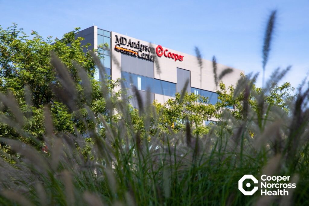 MD Anderson Cancer Center at Cooper with Cooper Norcross Health logo